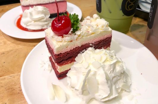 Red velvet cheese cake with whipped cream