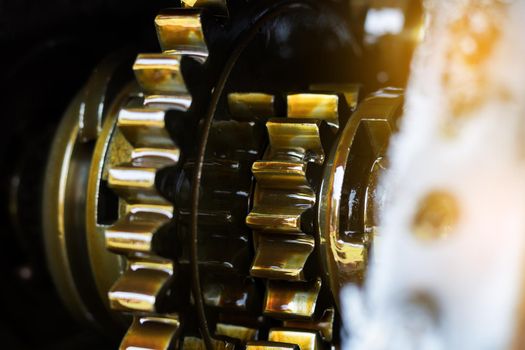 Close up internal engine gear tractor. Engine walking tractor.