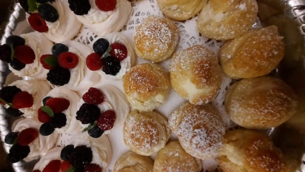 variety of cakes and desserts on table for holidays