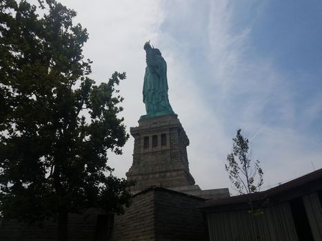 green copper statue of liberty landmark in New York city
