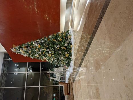 decorated christmas tree indoors office building