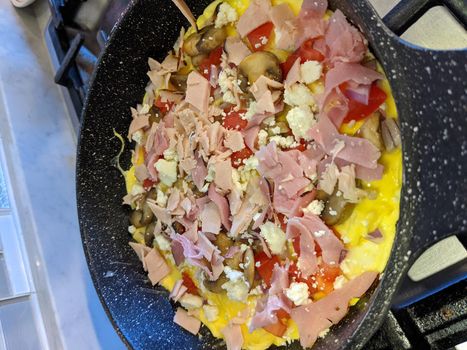 Omelet Cooking in Frypan Top View