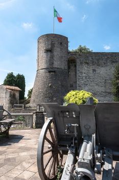Castle (La Rocca) in Bergamo old town, Italy. Memorial in the park. Bergamo, ITALY - August 19, 2020.