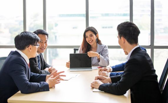 Multiethnic diverse group of business coworkers in team meeting discussion