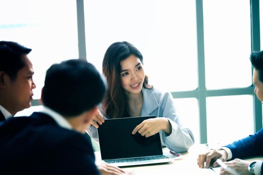 Multiethnic diverse group of business coworkers in team meeting discussion