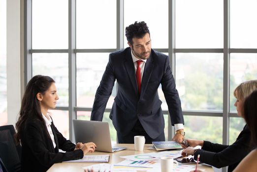 Multiethnic diverse group of business coworkers in team meeting discussion