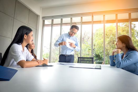 Multiethnic diverse group of business coworkers in team meeting discussion