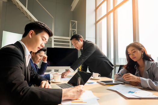 Multiethnic diverse group of business coworkers in team meeting discussion