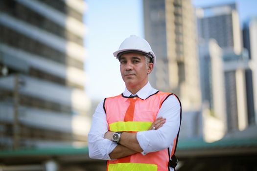 Engineering civil, Construction engineers discussion with architects at construction site or building site of highrise building with Surveying for making contour plans