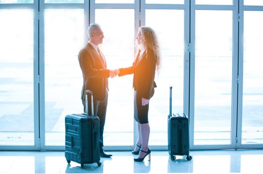 Business people on travel at Airport, Business man at international airport moving to terminal gate for airplane travel trip - Mobility concept and aerospace industry flight connections