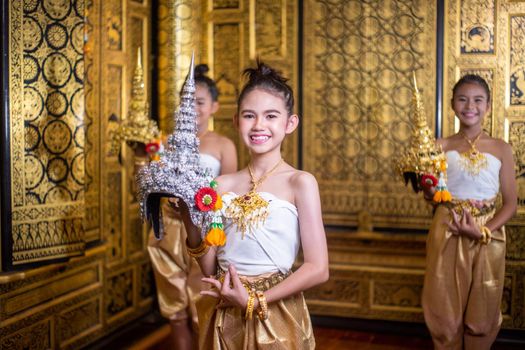 Thai traditional dress. Young kid Actors performs Thai ancient dancing Art of Thai classical dance in Thailand