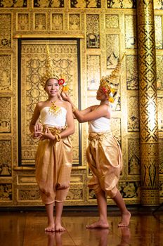 Thai traditional dress. Young kid Actors performs Thai ancient dancing Art of Thai classical dance in Thailand