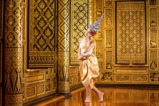 Thai traditional dress. Young kid Actors performs Thai ancient dancing Art of Thai classical dance in Thailand