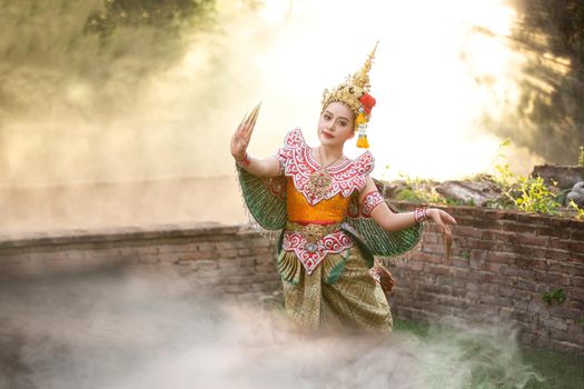 Beautiful Thai young woman portrait in Kinnaree traditional dress costume Art culture Thailand Dancing in masked khon Kinnaree in literature amayana, thailand culture Khon, Ayuttaya, Thailand .