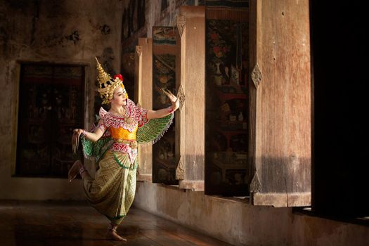 Beautiful Thai young woman portrait in Kinnaree traditional dress costume Art culture Thailand Dancing in masked khon Kinnaree in literature amayana, thailand culture Khon, Ayuttaya, Thailand .