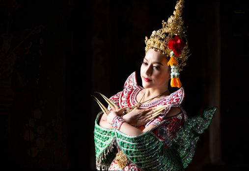 Beautiful Thai young woman portrait in Kinnaree traditional dress costume Art culture Thailand Dancing in masked khon Kinnaree in literature amayana, thailand culture Khon, Ayuttaya, Thailand .