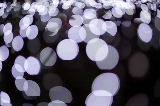 Abstract blurred Christmas light bokeh background.