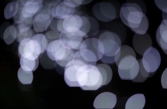 Abstract blurred Christmas light bokeh background.