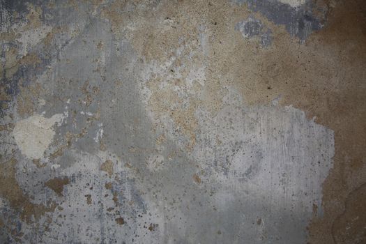 abstract part of the old brick wall with ruined plaster for vintage background and wallpaper in the style of sepia