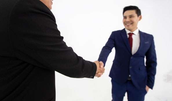 handshake of business People Colleagues Teamwork Meeting .Hold hand and shaking hand in office