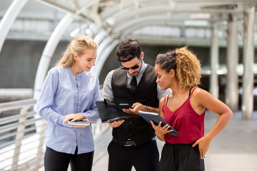 business persons talking or chatting to each other outside the office