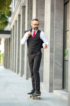 Bearded hipster businessman holding coffee cup portraits.