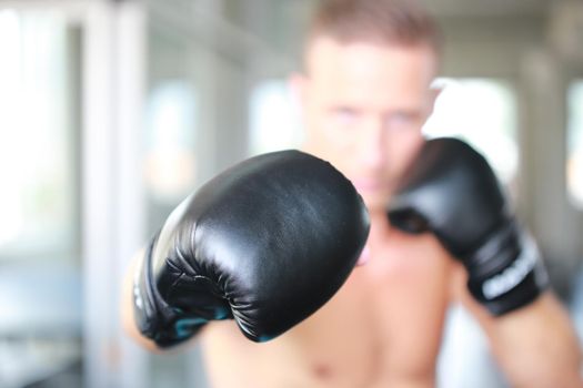 young athlete people with boxing gloves, exercise in fitness gym