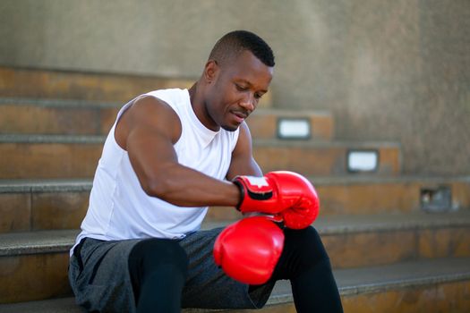 young athlete people with boxing gloves, exercise in fitness gym