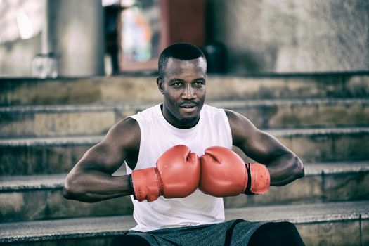 young athlete people with boxing gloves, exercise in fitness gym