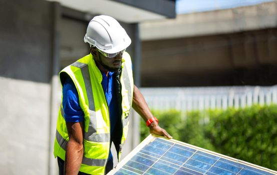 maintenance engineer, Solar energy systems engineer perform analysis solar panels, Portrait of engineer man or worker, people, with solar panels or solar cells on the roof in farm. Power plant with green field, renewable energy source in American. Eco technology for electric power.