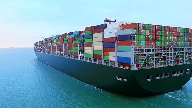 Container ship in import export and business logistics, By crane, Trade Port, Shipping cargo to harbor, International transportation, Business logistics concept