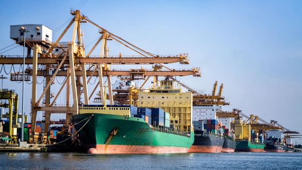 Container ship in import export and business logistics, By crane, Trade Port, Shipping cargo to harbor, International transportation, Business logistics concept