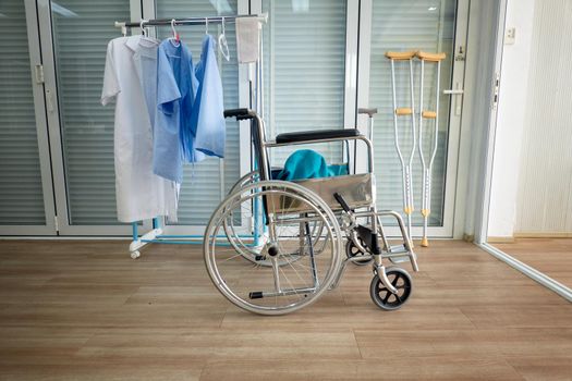 Row Wheelchairs in the clinic or hospital ,Wheelchairs waiting for patient services.