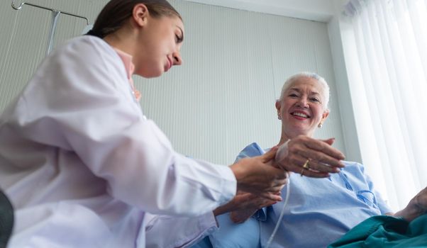 Femen doctor and elderly patient, Female doctor doing medical exam to a senior woman 