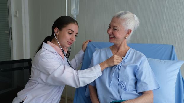 Femen doctor and elderly patient, Female doctor doing medical exam to a senior woman 