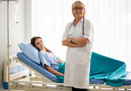 Doctor check up and discuss with patient in clinic or doctor talk with women patient in hospital