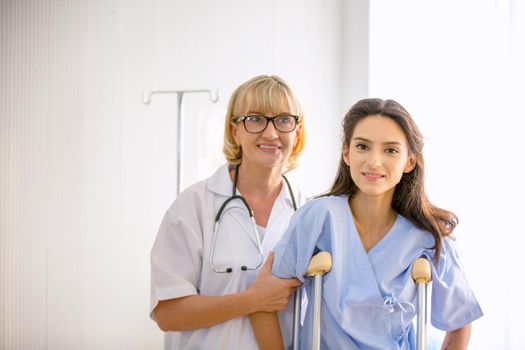 Doctor check up and discuss with patient in clinic or doctor talk with women patient in hospital