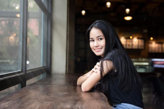 portrait of young charming beautiful girl with smile, authentic moments of real emotion.