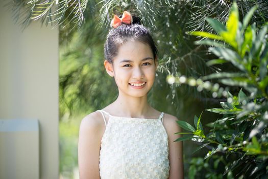 Portrait Of Smiling Young Woman Outdoors