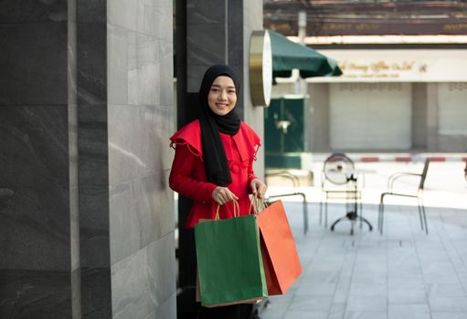 Woman with Shopping Bags