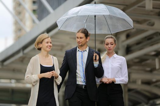 Business People Walking Handshake Professional Urban City Concept., Business people working in office on desktop computer, Group of happy business people in smart casual wear looking at the laptop and gesturing. Achieving success.