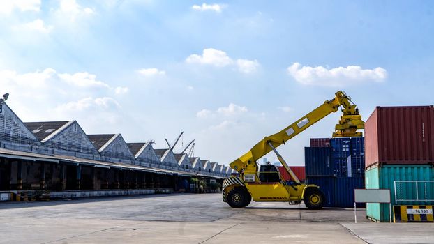 Logistics and transportation of Container Cargo ship and Cargo plane with working crane bridge in shipyard at sunrise, logistic import export and transport industry background