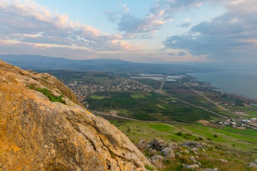 Sunrise view of the north part of the Sea of Galilee, and the village Migdal, from mount Arbel. Northern Israel