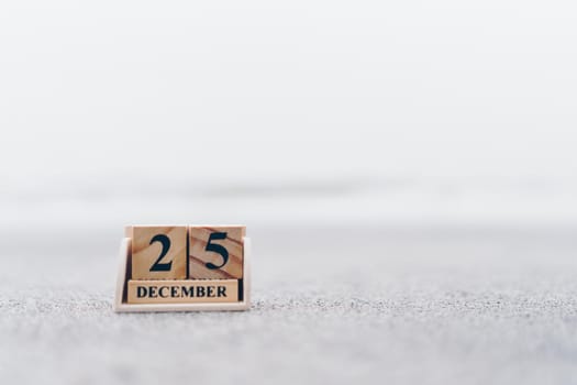 Wooden brick block show date and month calendar of 25th December or Chritstmas day. Celebration and holiday long weekend season concept.