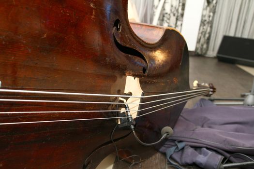 Details of Old Cello on the ground, macro close up