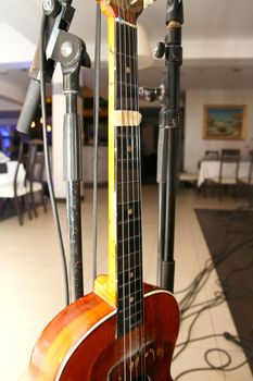 Acoustic guitar waiting to be played, close up