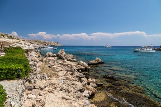 Scenic view on the bay with turquoise water and the beach of Kalithea Springs at Greek island Rhodes 