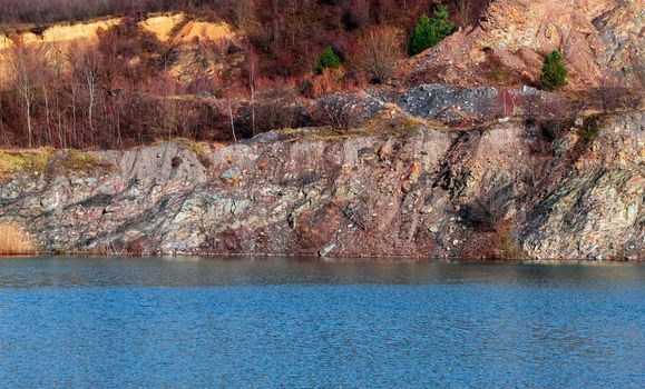 A coal lake with surrounding trees