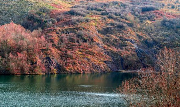 A lake that was created from coal located in Romania in a small village called Doman