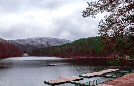 An accumulation lake during the winter, in a tourist area in southwestern Romania